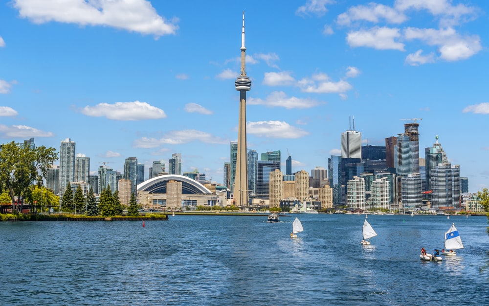 Toronto's skyline with CN Tower over lake
